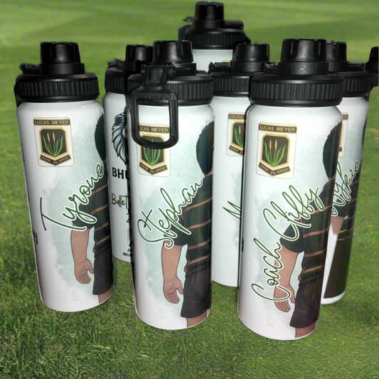 Set of water bottles with personalized designs on a textured surface