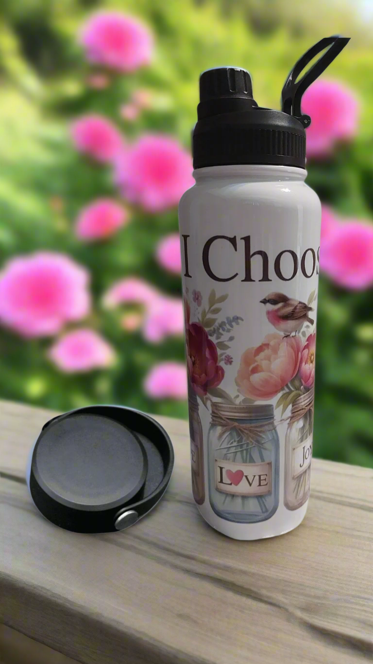White water bottle with floral design and text on a white background