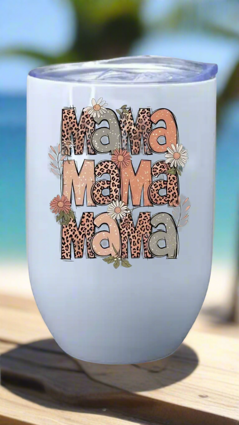 Tumbler with 'Mama' text in various colors and styles on a light blue background